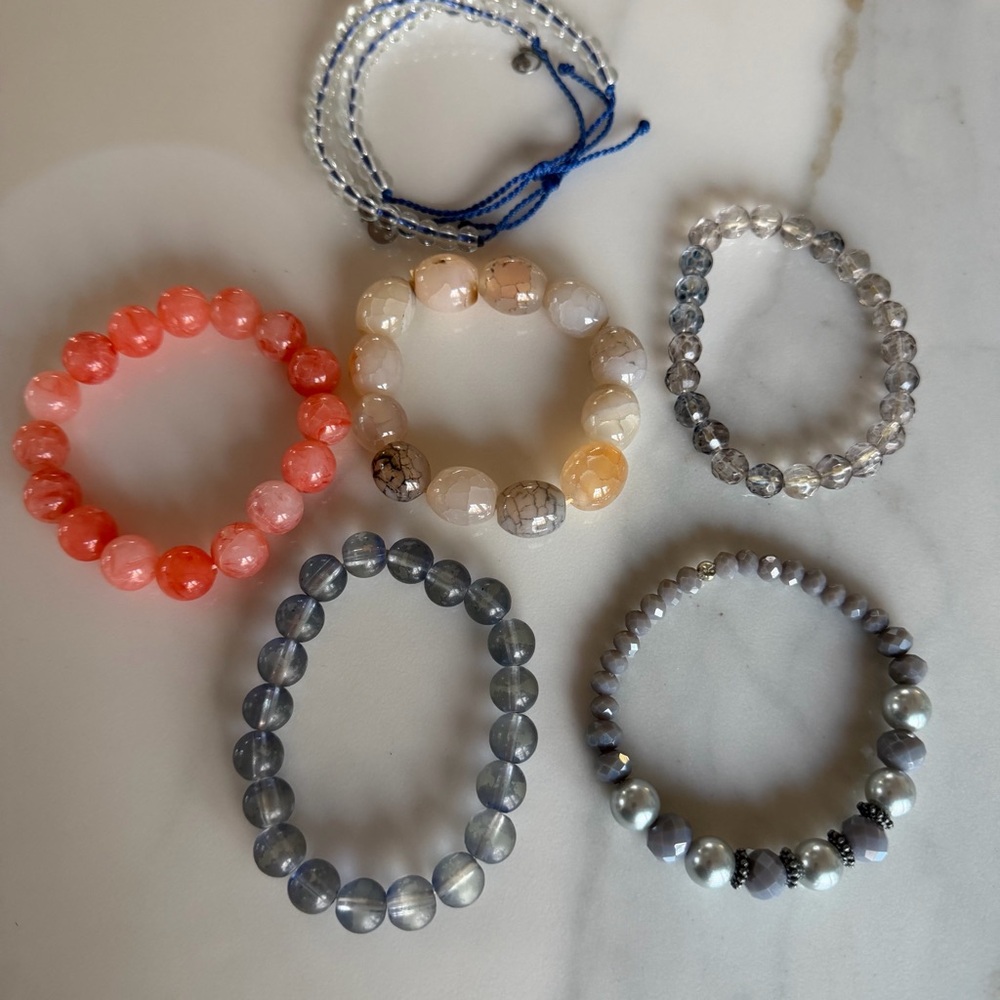 Collection of  seven Beaded Bracelets in Various Colors